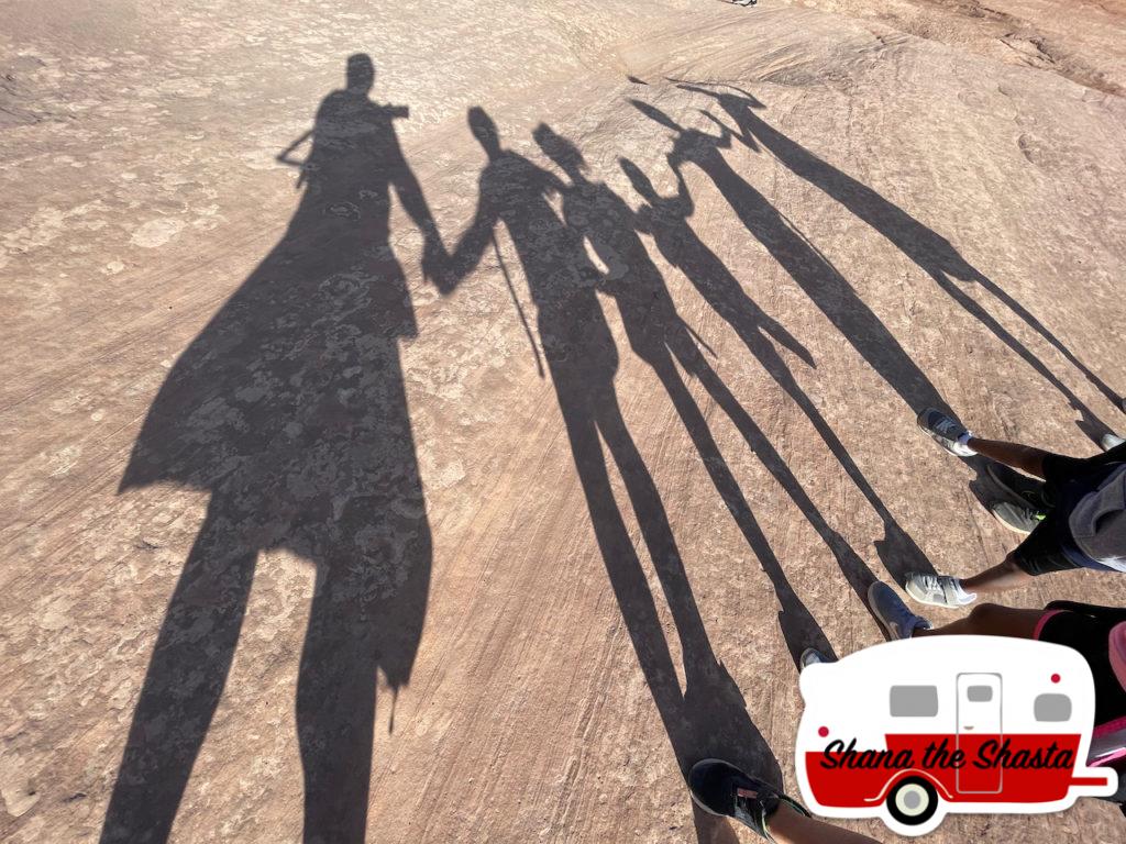 108-Family-Shadows-at-Delicate-Arch