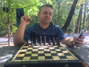 camping outdoor chess couple