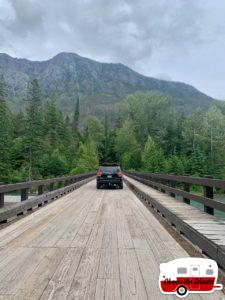 Crossing-Wood-Bridge-in-Glacier-National-Park