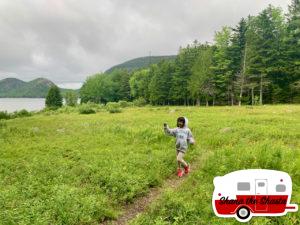 Skipping-in-Meadow-at-Jordan-Pond